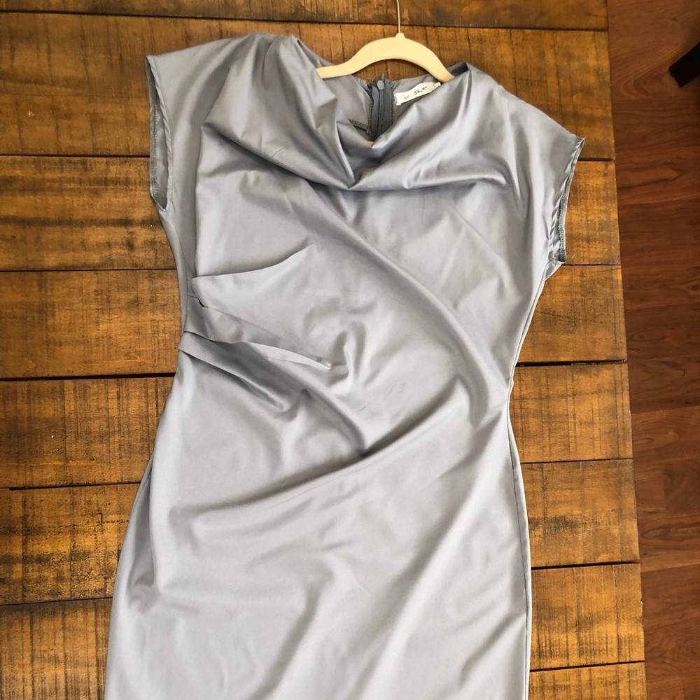 Office to date night dress. Never worn.